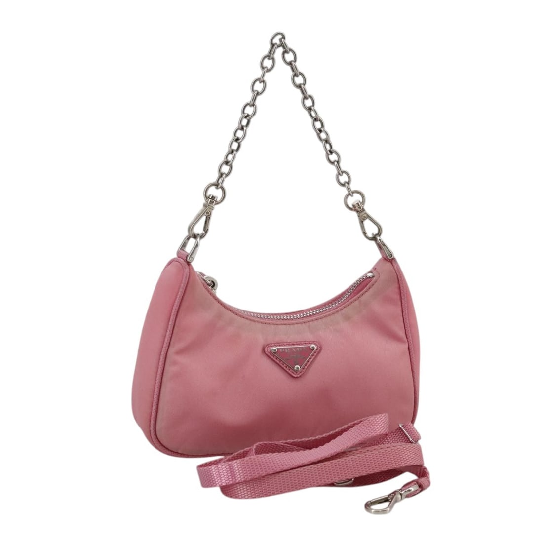 Pink Nylon PRADA 2way Shoulder Bag with Silver Accents: Pink Nylon PRADA 2way Shoulder Bag with Silver Accents This PRADA shoulder bag features a 2-way design crafted from pink and silver nylon. Made for women, the bag offers both a shoulder strap and hand