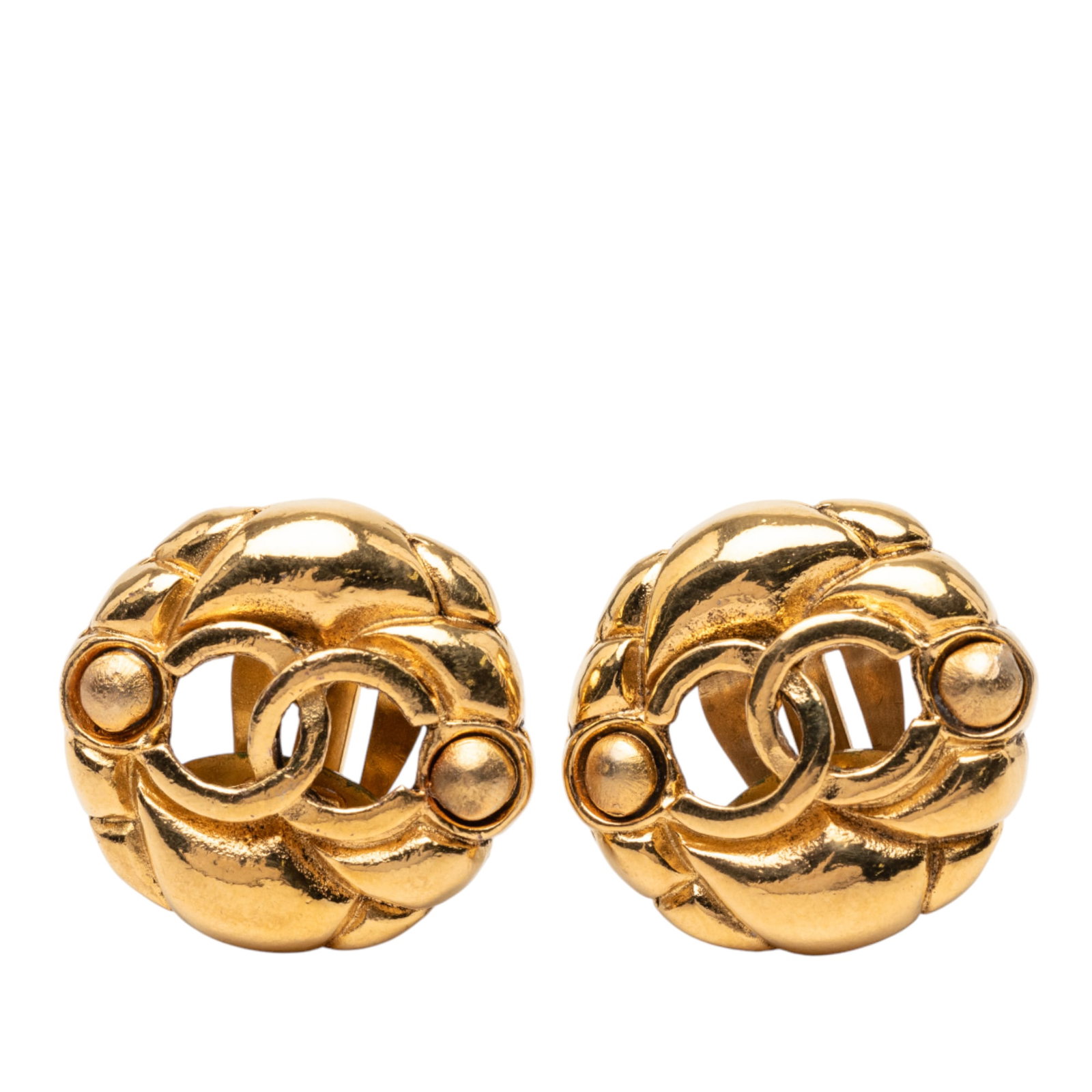 Chanel CC Logo Gold Tone Metal Clip On Round Earrings: Chanel CC Logo Gold Tone Metal Clip On Round Earrings These Chanel clip-on earrings feature a round design with a gold tone metal body and the iconic CC motif. Made in France, they are part of Chanel'