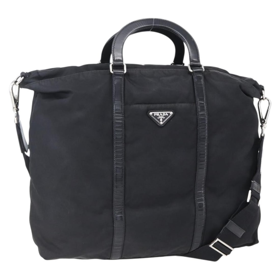 Prada Black Nylon Tote with Shoulder Strap 2way Silver Trim: Prada Black Nylon Tote with Shoulder Strap 2way Silver Trim This PRADA tote bag is crafted from black nylon with silver-tone accents and features both top handles and a detachable shoulder strap for v