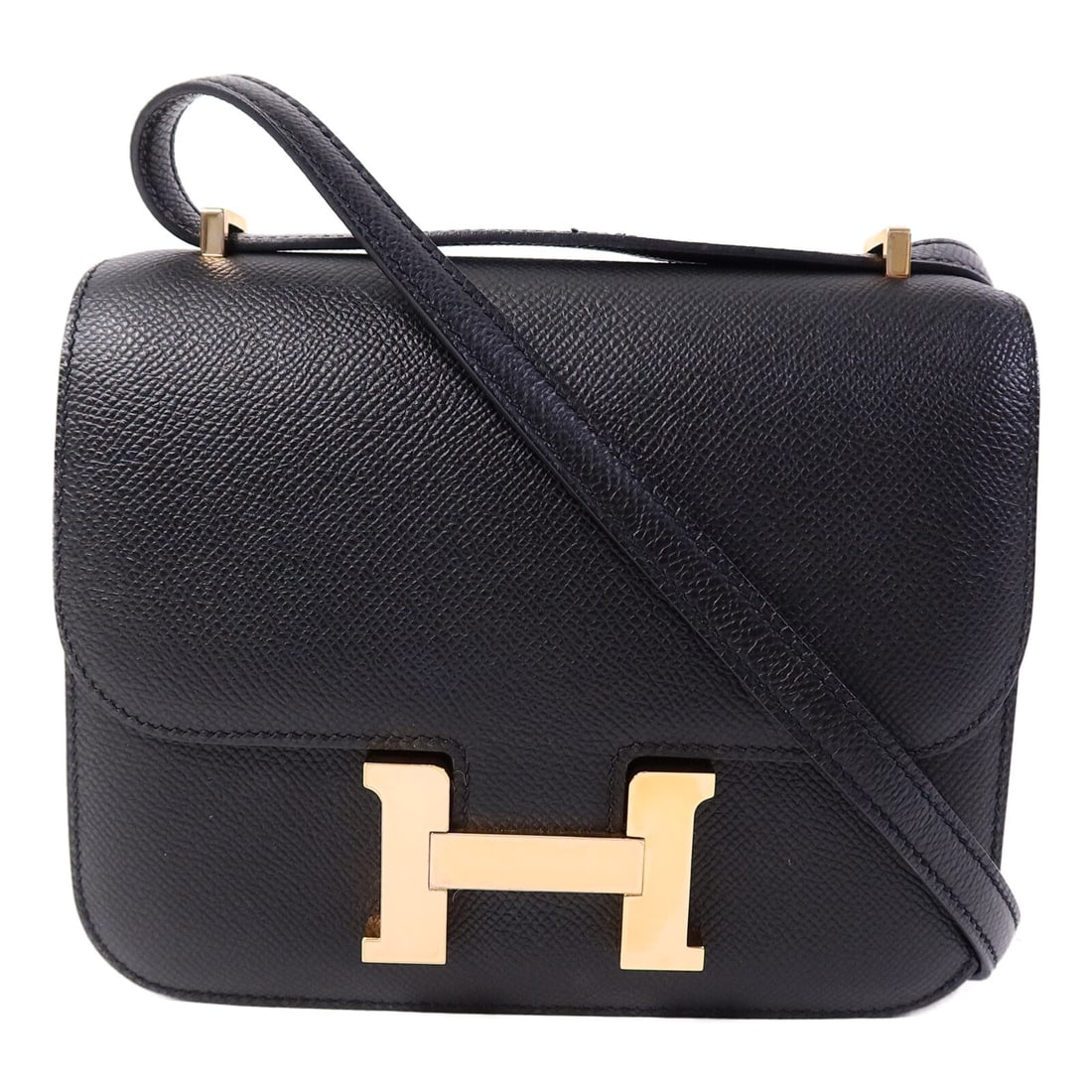 Hermes Constance Mini Black Epsom Leather Shoulder Bag GHW: Hermes Constance Mini Black Epsom Leather Shoulder Bag GHW This Hermes Constance Mini shoulder bag is crafted from durable black Epsom calfskin leather and features a sleek, structured silhouette. Des