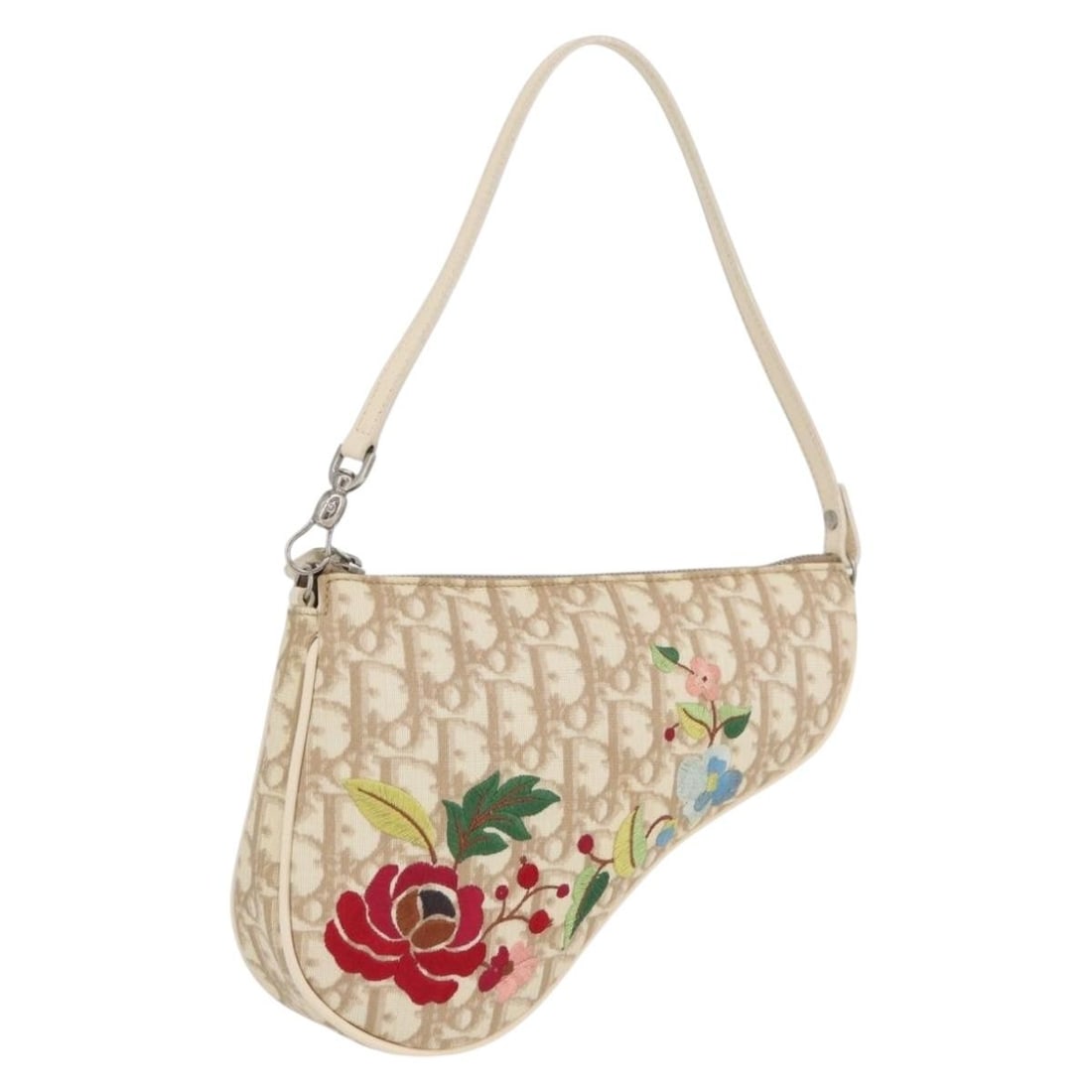 Dior Saddle Pouch Beige Trotter PVC Canvas Embroidered Handbag with Dust Bag: Dior Saddle Pouch Beige Trotter PVC Canvas Embroidered Handbag with Dust Bag This Christian Dior Saddle Pouch features the iconic Trotter canvas with PVC leather accents in beige and silver. Designed 