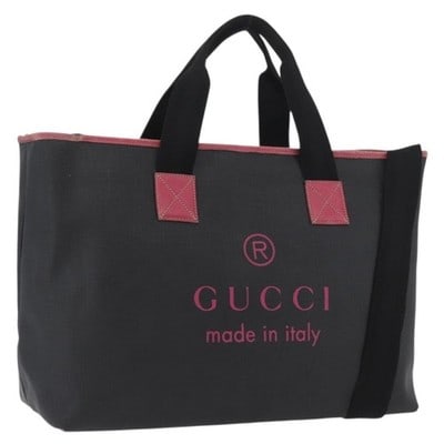 Gucci Black PVC Leather Tote Bag Italy 162785: Gucci Black PVC Leather Tote Bag Italy 162785 This GUCCI tote bag is crafted from black PVC leather and features a spacious design with both shoulder and handle carry options. The bag shows significan