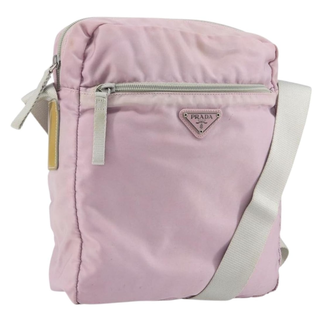 Pink Nylon Prada Shoulder Bag with Silver Accents Made in Italy: Pink Nylon Prada Shoulder Bag with Silver Accents Made in Italy This PRADA shoulder bag features a pink and silver nylon exterior and offers a versatile and practical design. The bag is made in Italy 
