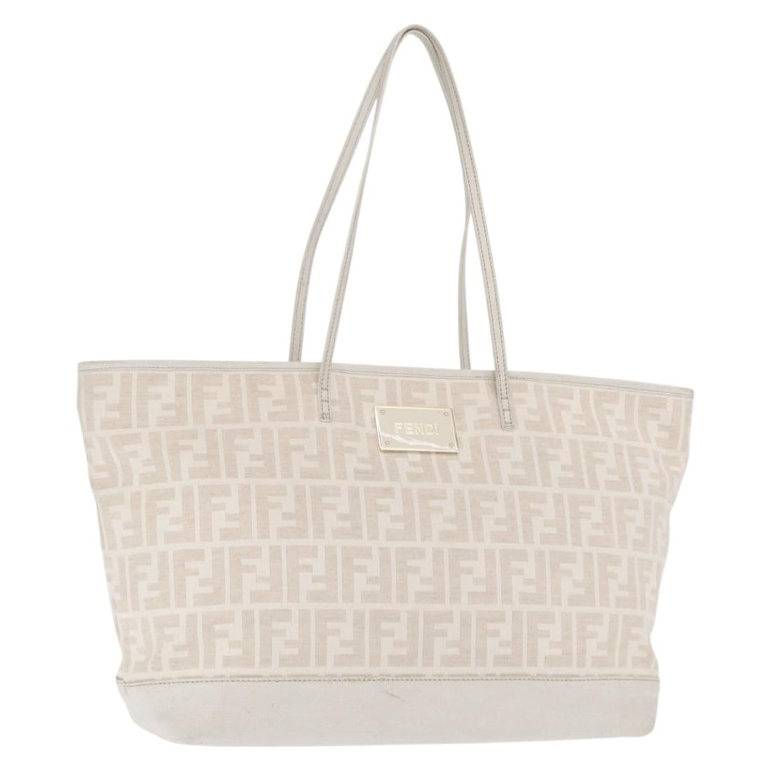 Beige Canvas and Leather Tote Bag by Fendi with Zucca Pattern: Beige Canvas and Leather Tote Bag by Fendi with Zucca Pattern This Fendi Roll Tote for women features the iconic Zucca canvas with beige tones and leather accents. Made in Italy, the bag measures 35cm
