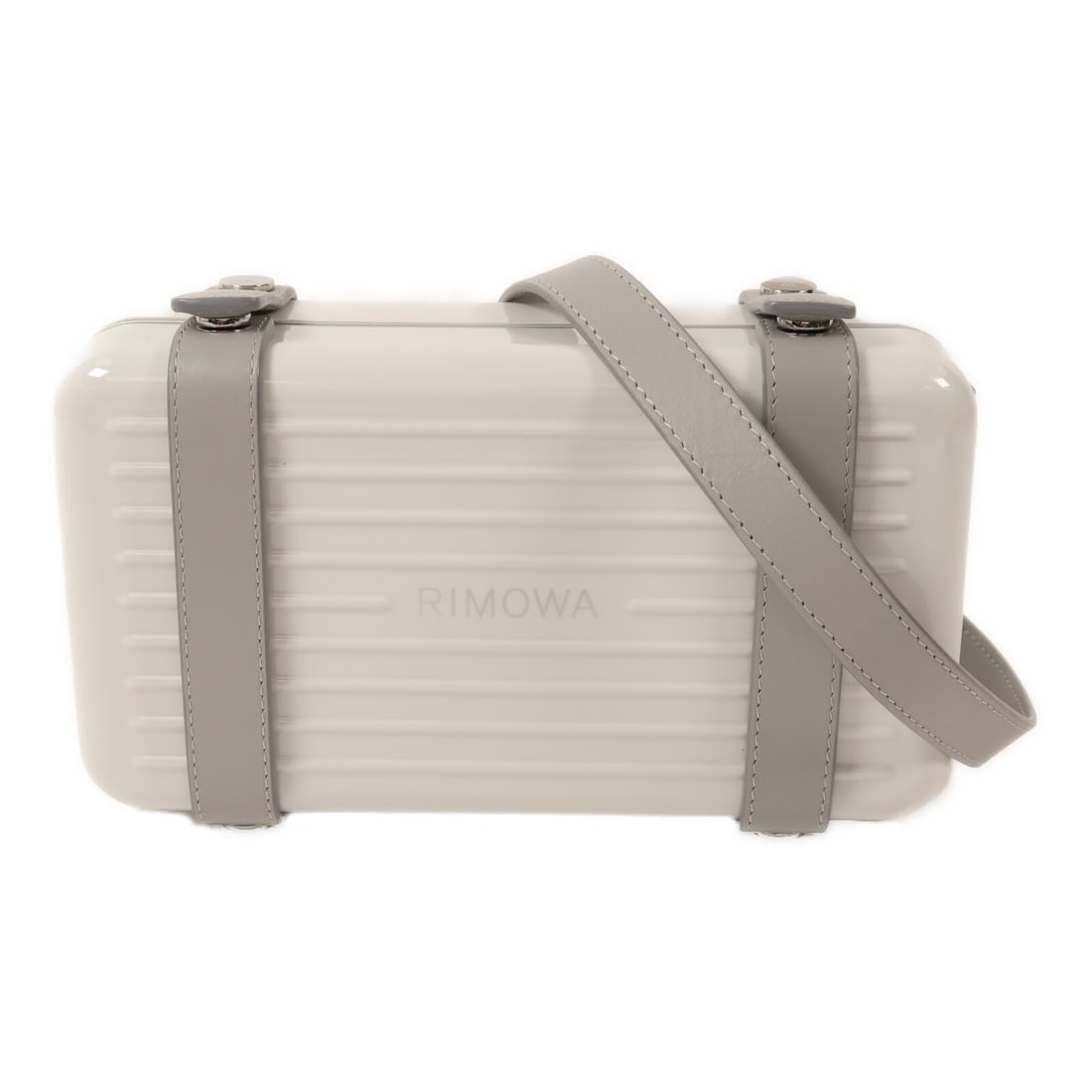RIMOWA White Aluminum Crossbody Shoulder Bag: RIMOWA White Aluminum Crossbody Shoulder Bag This RIMOWA cross-body shoulder bag features a sleek white exterior crafted from polycarbonate with aluminum accents. Designed for unisex use, it offers a 