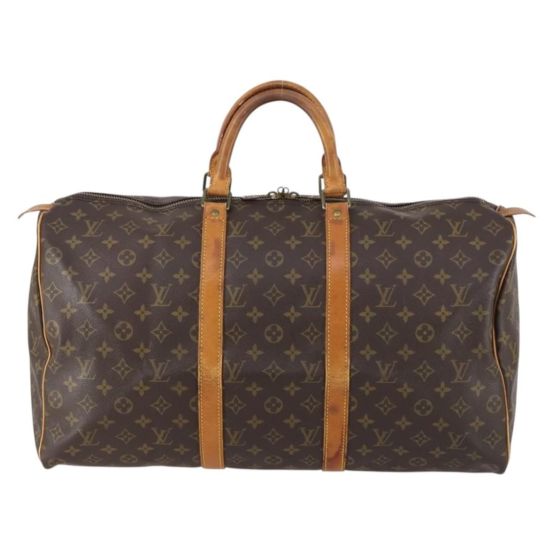 Keepall Monogram Canvas Travel Bag by Louis Vuitton: Keepall Monogram Canvas Travel Bag by Louis Vuitton This Louis Vuitton Keepall Bag features the iconic monogram canvas in brown and is designed for unisex use. The exterior shows signs of wear includi