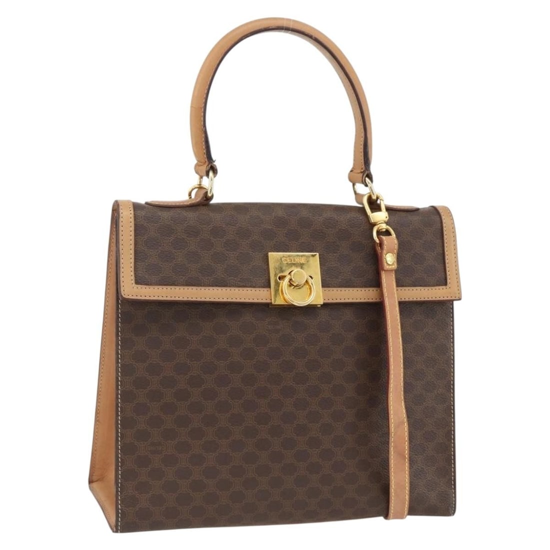 Celine Macadam Brown PVC and Leather Handbag Gold Tone Italy: Celine Macadam Brown PVC and Leather Handbag Gold Tone Italy This is an authentic CELINE Macadam Canvas hand bag crafted from brown PVC leather and Macadam canvas with gold-tone details. Designed for 