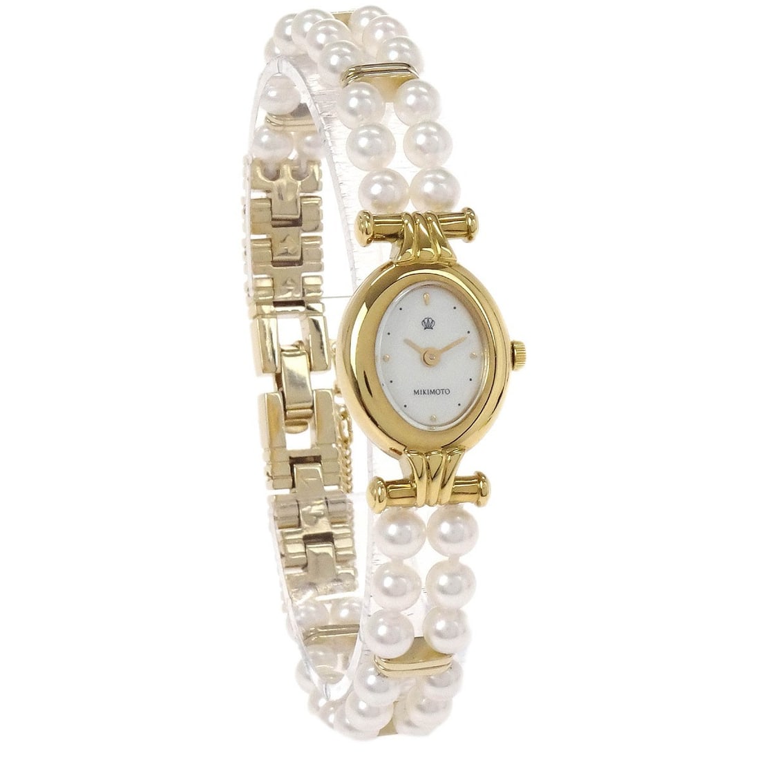 Mikimoto NNS-8014PF Women's Pearl Quartz Wristwatch Gold Tone Bracelet: Mikimoto NNS-8014PF Women's Pearl Quartz Wristwatch Gold Tone Bracelet This Mikimoto NNS-8014PF JAL women's wristwatch features a quartz movement and classic analog display. The oval-shaped case is cr