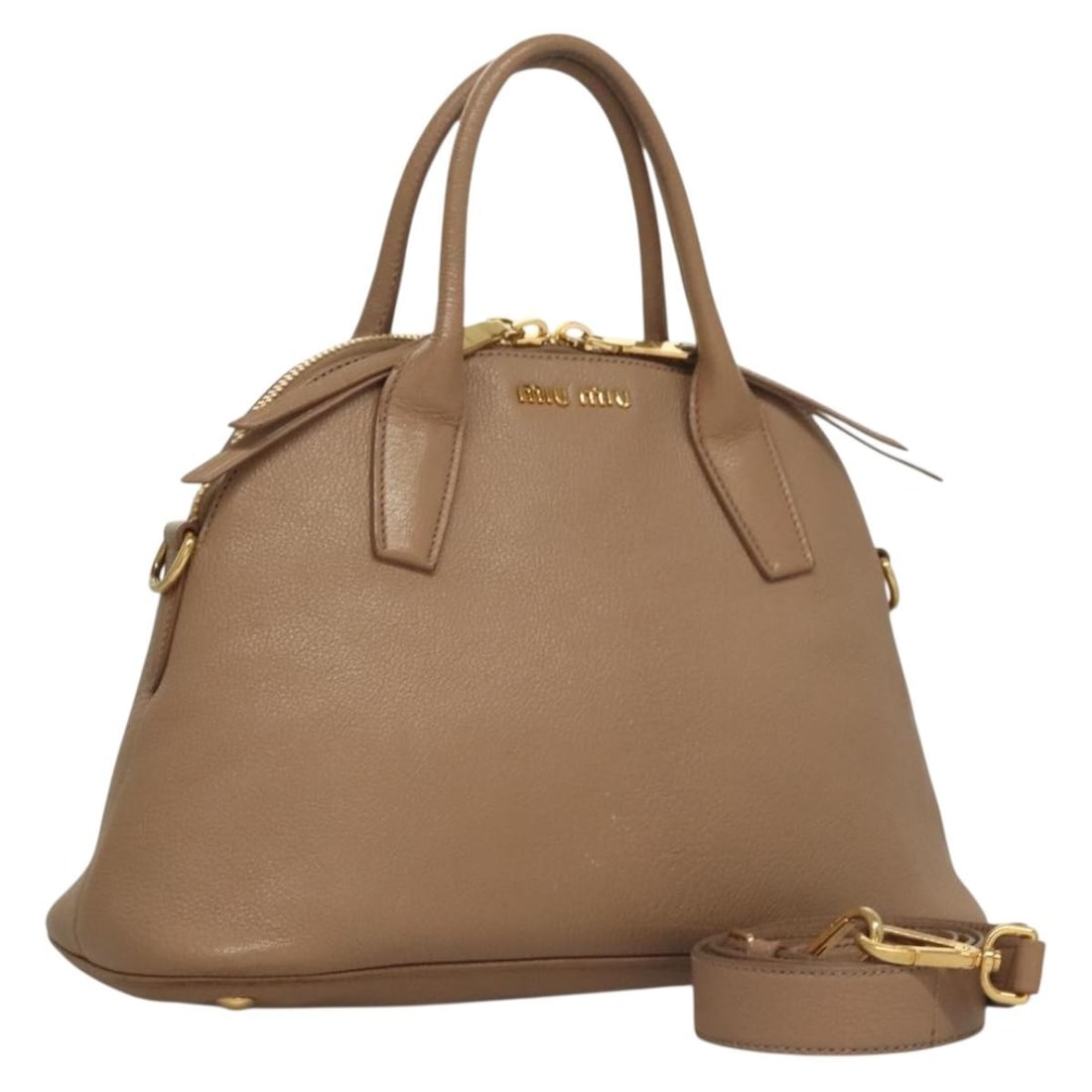 Miu Miu Leather Hand Bag Beige Gold Authentic 2-Way Made in Italy: Miu Miu Leather Hand Bag Beige Gold Authentic 2-Way Made in Italy This stylish Miu Miu handbag is crafted from luxurious leather in a sophisticated beige and gold color scheme. With a height of approx