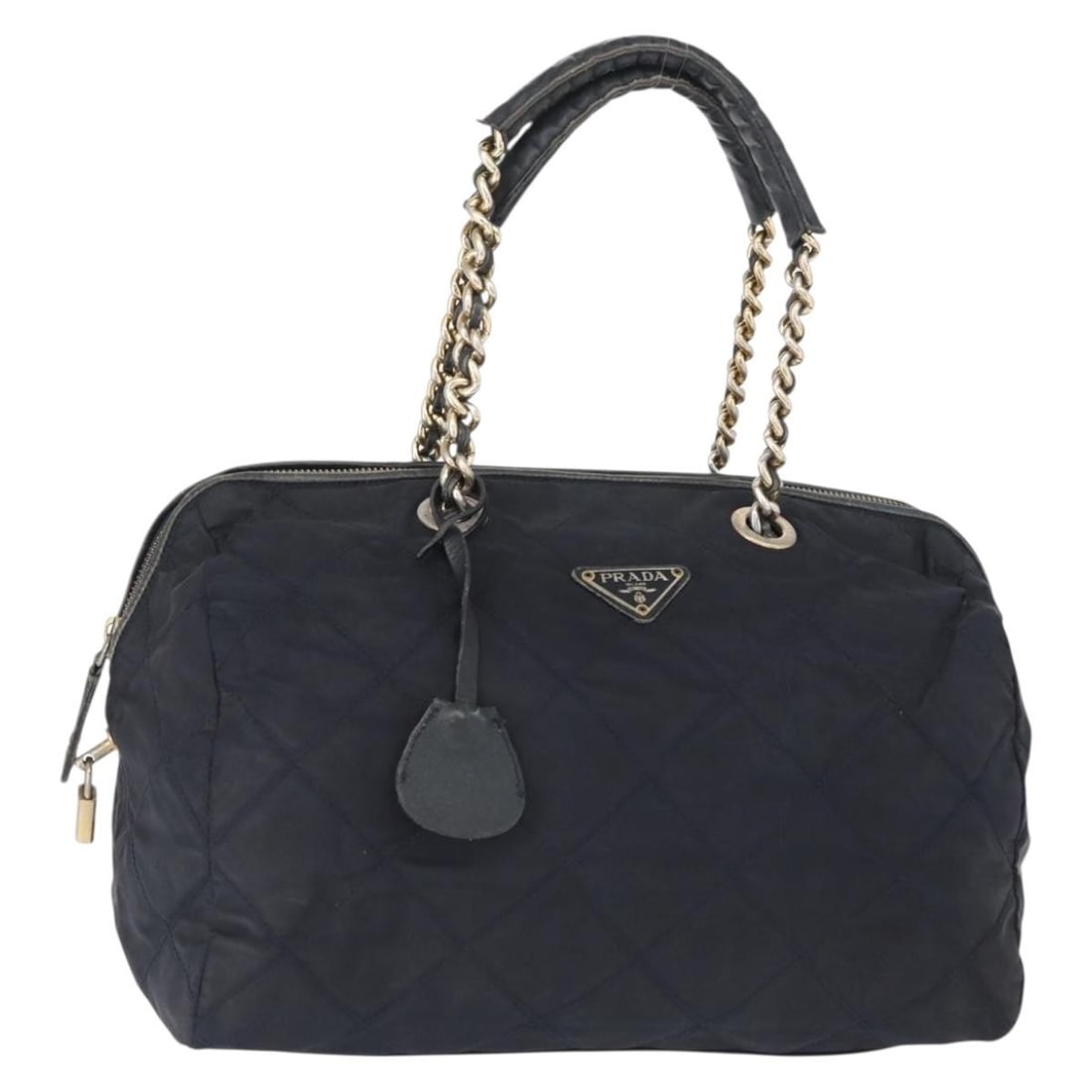 Prada Navy Nylon Shoulder Bag with Padlock and Clochette: Prada Navy Nylon Shoulder Bag with Padlock and Clochette This PRADA shoulder bag is crafted from navy nylon with gold-tone accents. Designed for women, it features a spacious main compartment and incl