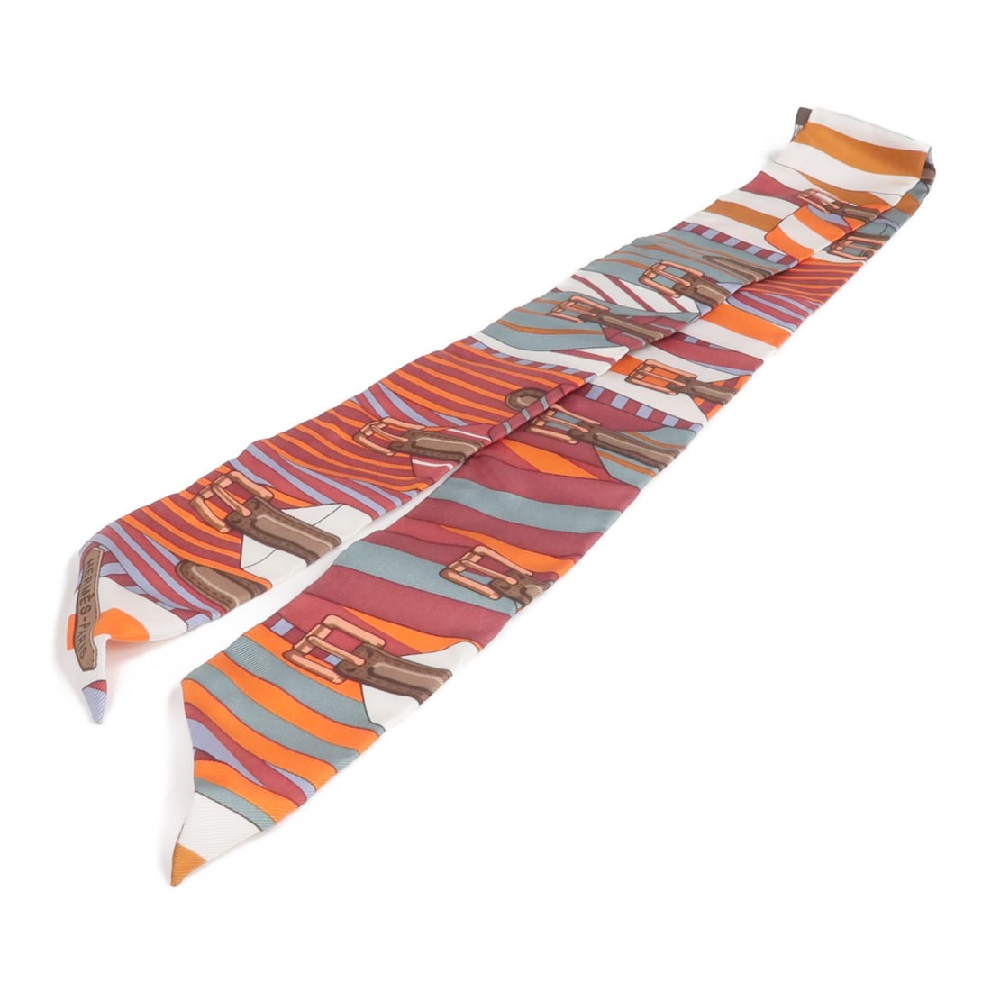 Silk Twilly Scarf in Green by Hermes France: Silk Twilly Scarf in Green by Hermes France Hermes Twilly scarf crafted from luxurious silk in a vibrant green color. Designed for women, this elegant accessory showcases the brand's impeccable crafts