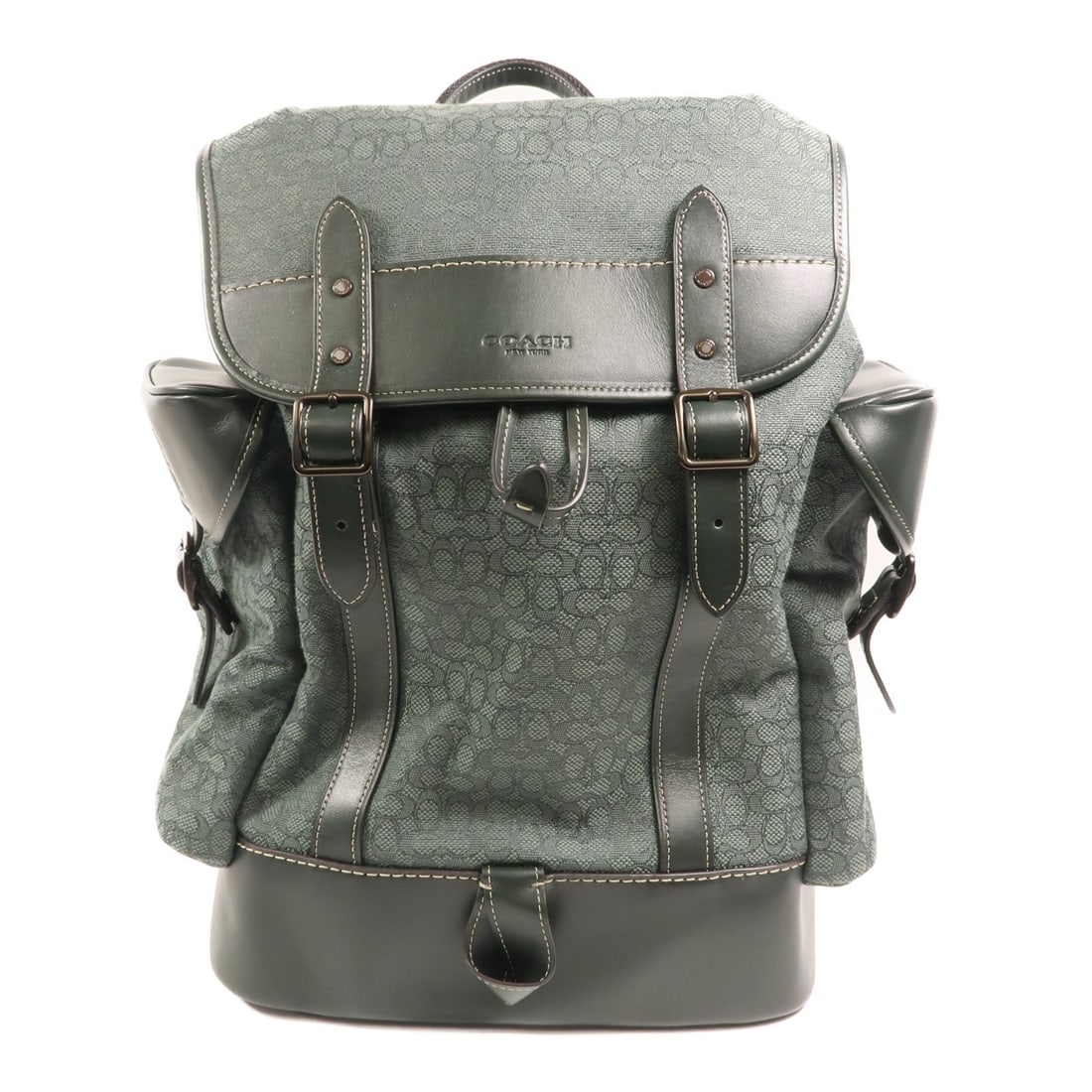COACH Green Canvas Hitch Rucksack Backpack CM387: COACH Green Canvas Hitch Rucksack Backpack CM387 This COACH Hitch Backpack CM387 is crafted from green canvas and designed in a rucksack style. It features a spacious interior, making it suitable for 
