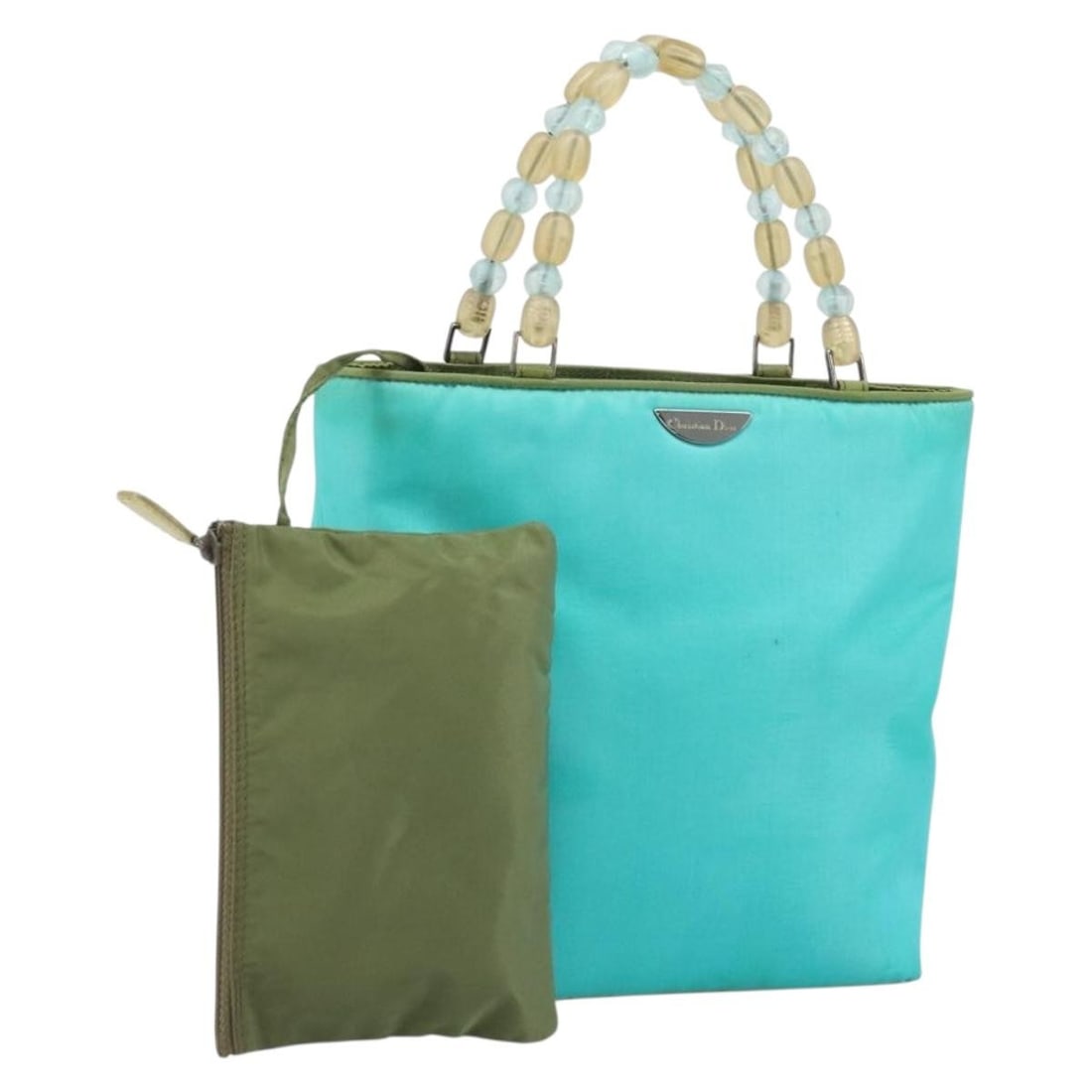 Maris Pearl Turquoise Blue Nylon Handbag by Christian Dior with Silver Accents: Maris Pearl Turquoise Blue Nylon Handbag by Christian Dior with Silver Accents This Christian Dior Maris Pearl hand bag features a turquoise blue nylon exterior with silver-tone accents. Designed for 