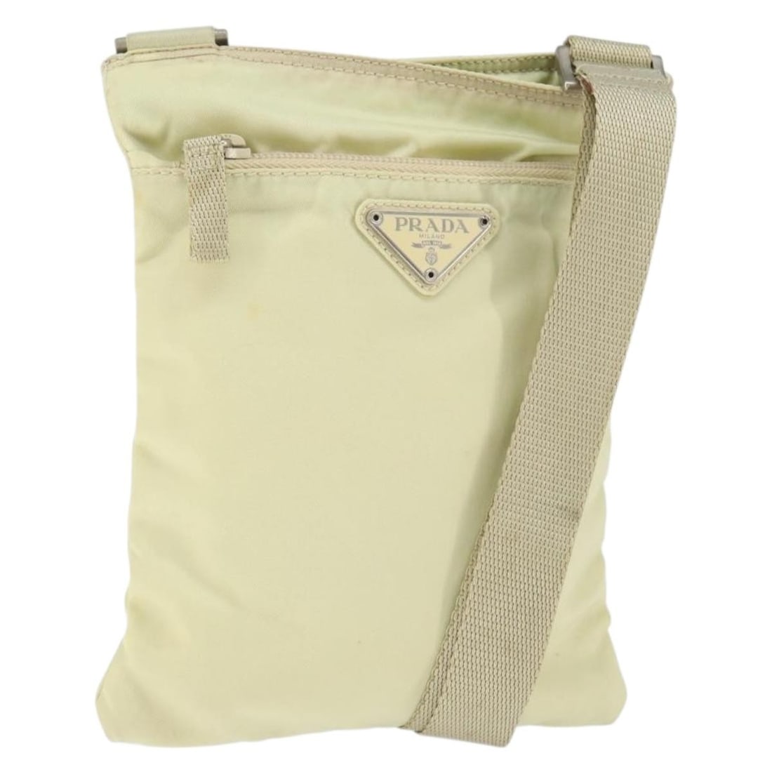 Prada Ivory Silver Nylon Shoulder Bag Italy 8.3in: Prada Ivory Silver Nylon Shoulder Bag Italy 8.3in This PRADA shoulder bag is crafted from ivory and silver nylon, offering a modern and lightweight design. Made in Italy, the bag features an adjustabl