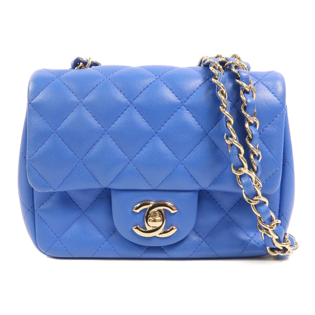 Chanel Mini Classic 17 Lambskin Blue Shoulder Bag GHW: Chanel Mini Classic 17 Lambskin Blue Shoulder Bag GHW This CHANEL Mini Classic 17 shoulder bag features a luxurious lambskin leather exterior in blue, complemented by gold-tone hardware. Designed for 