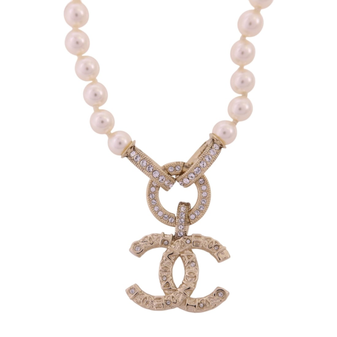 Chanel Gold Tone CC Pendant Necklace AB5996B Strass Accent: Chanel Gold Tone CC Pendant Necklace AB5996B Strass Accent This CHANEL necklace features the iconic CC design, crafted with gold-tone metal and embellished with strass accents. The necklace is in very