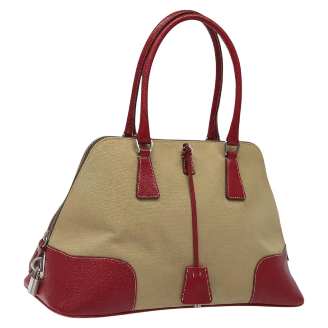 Beige Canvas PRADA Women's Handbag with Padlock and Accessories: Beige Canvas PRADA Women's Handbag with Padlock and Accessories This PRADA handbag features a beige canvas exterior and is designed for women. It includes a padlock, two keys, a clochette, and a guara