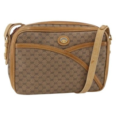Gucci beige gold Micro GG Supreme shoulder bag 001 261 1096: Gucci beige gold Micro GG Supreme shoulder bag 001 261 1096 This GUCCI Micro GG Supreme shoulder bag features a beige and gold colorway crafted from PVC leather and Micro Small GG canvas. The bag is d
