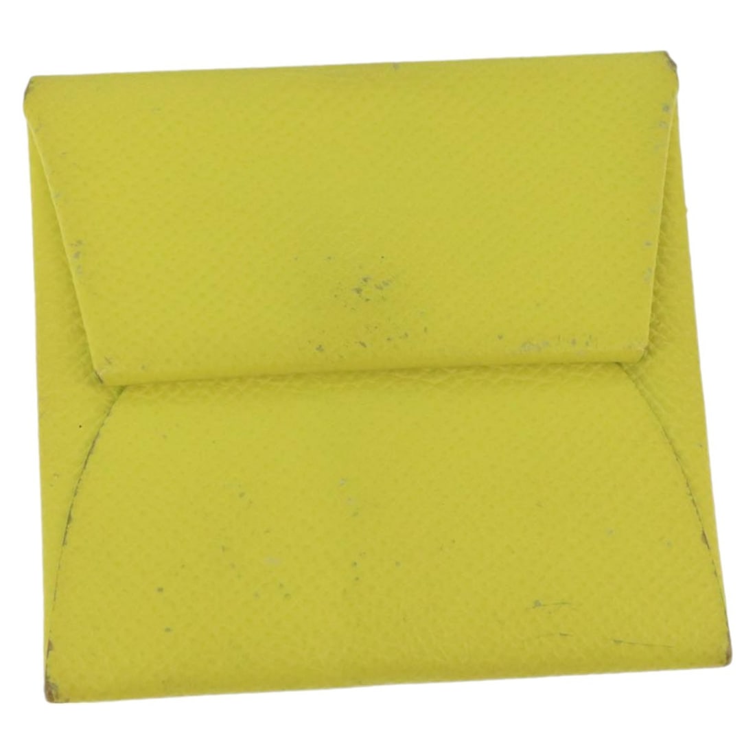 Hermes Bastia Yellow Leather Coin Purse with Silver Accents: Hermes Bastia Yellow Leather Coin Purse with Silver Accents This is a Hermes Bastia coin purse crafted from yellow leather with silver-tone accents. Designed for women, it features a compact square si