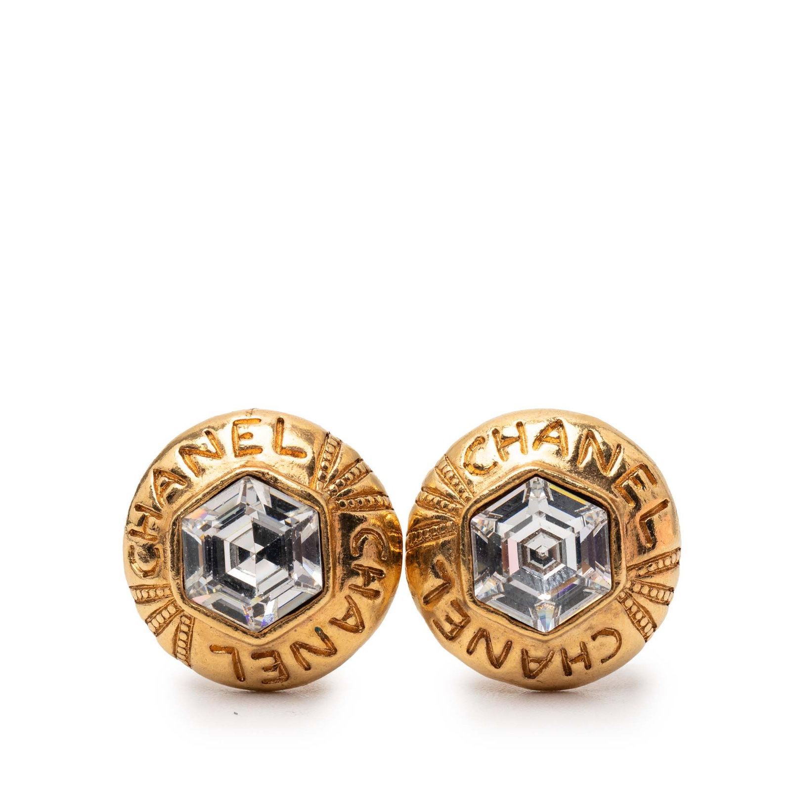 Chanel Hexagonal Clip On Earrings with Crystal Embellished Logo Gold Plated: Chanel Hexagonal Clip On Earrings with Crystal Embellished Logo Gold Plated These Chanel earrings feature gold plated metal bodies with crystal embellishments and hexagonal shapes. They are designed w