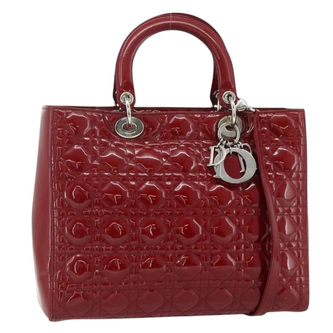 Christian Dior Lady Dior Red Patent Leather Shoulder Bag Charm Strap: Christian Dior Lady Dior Red Patent Leather Shoulder Bag Charm Strap This Christian Dior Lady Dior Canage Large Bag is crafted from red patent leather with silver-tone accents. Designed as a versatile