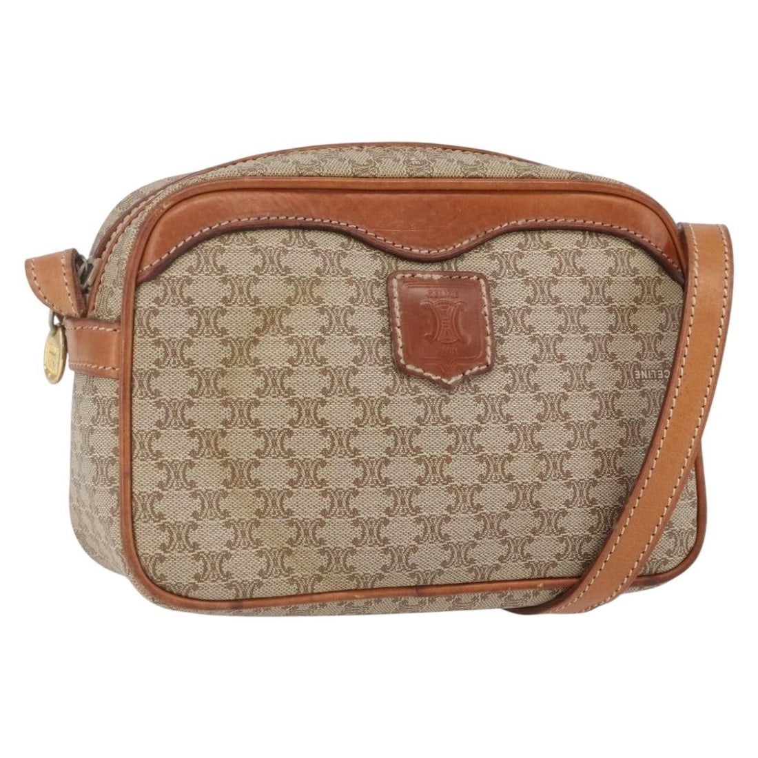 Beige Macadam Canvas Shoulder Purse by CELINE PVC Leather Gold Details: Beige Macadam Canvas Shoulder Purse by CELINE PVC Leather Gold Details This CELINE Macadam shoulder bag features a beige and gold PVC leather exterior with the signature Macadam canvas pattern. Design
