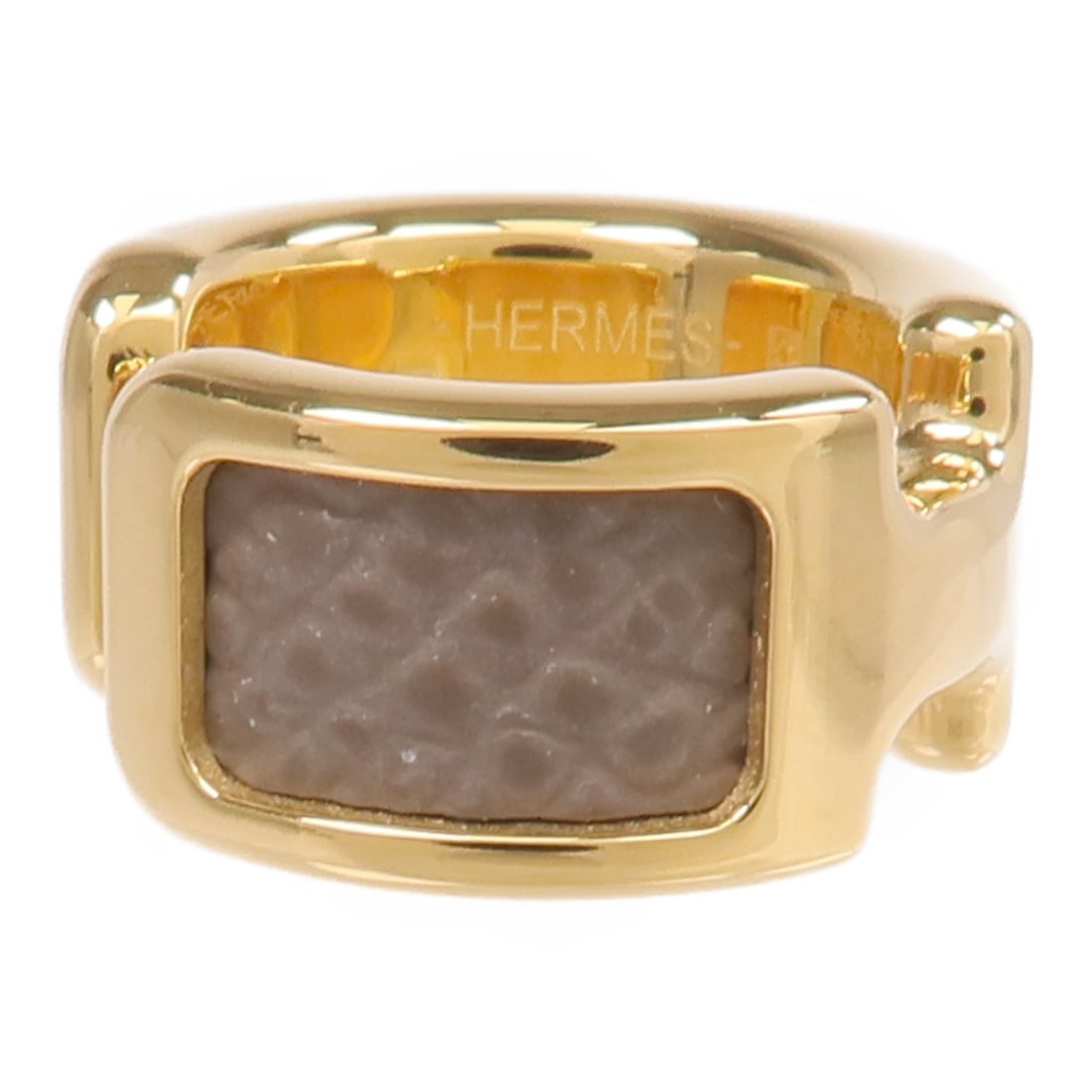 Hermes Olympe Gray Calfskin and Gold Tone Ear Cuff Earring: Hermes Olympe Gray Calfskin and Gold Tone Ear Cuff Earring This Hermes Olympe ear cuff earring features a sophisticated combination of gray calfskin leather and metal. Made in France, the piece is des