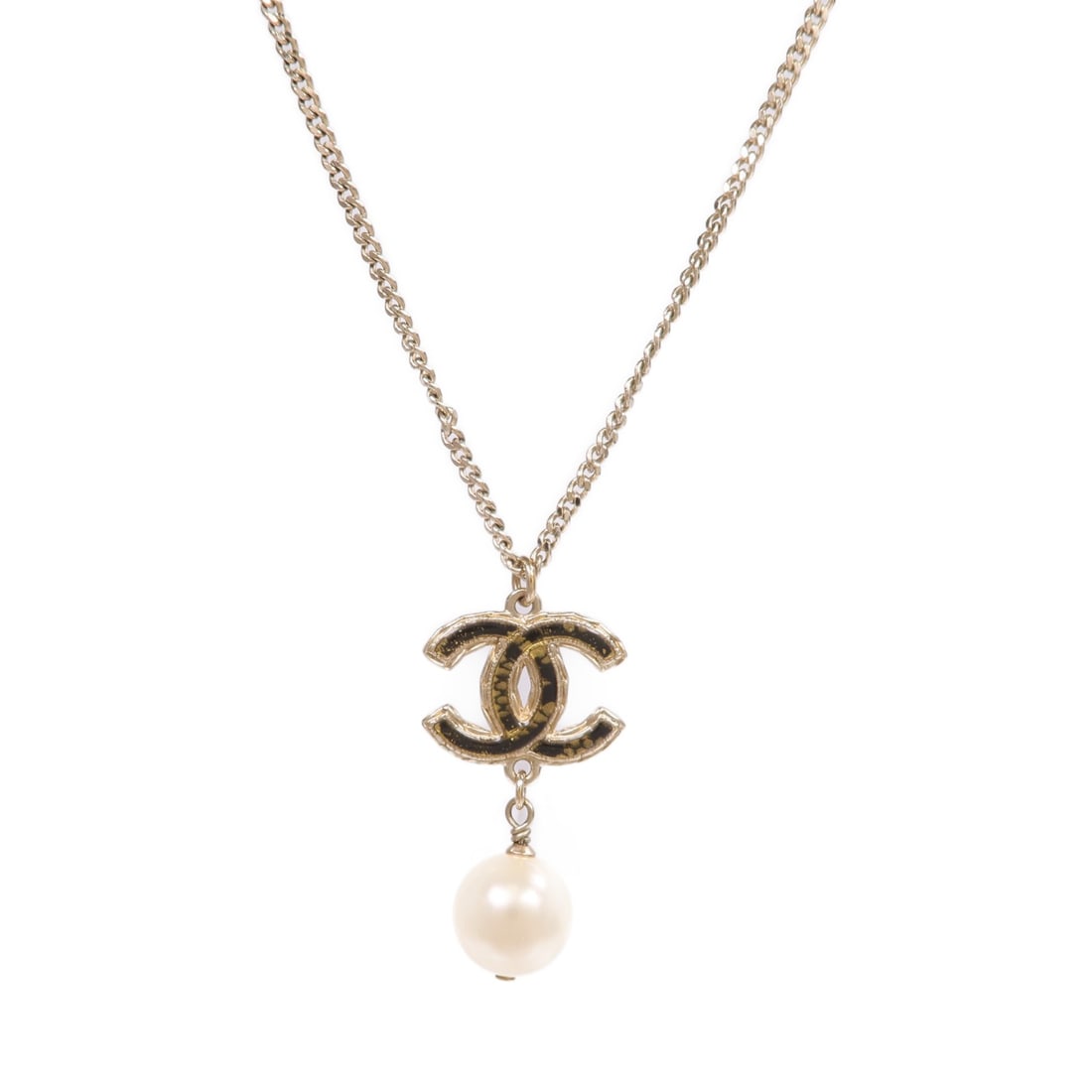 Gold Tone CHANEL Necklace with CC Logo Pendant: Gold Tone CHANEL Necklace with CC Logo Pendant This CHANEL necklace features the iconic CC logo and is crafted from gold-toned metal. Designed without a main stone, it offers a classic and elegant loo