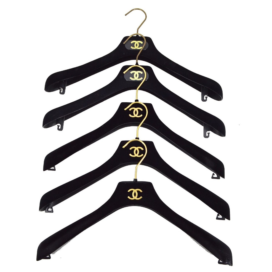 CHANEL Black Velvet Traditional Hanger Set of 5: CHANEL Black Velvet Traditional Hanger Set of 5 This luxurious set of five traditional hangers from CHANEL features a sleek black velvet finish, perfect for enhancing your wardrobe. Crafted in Italy, 