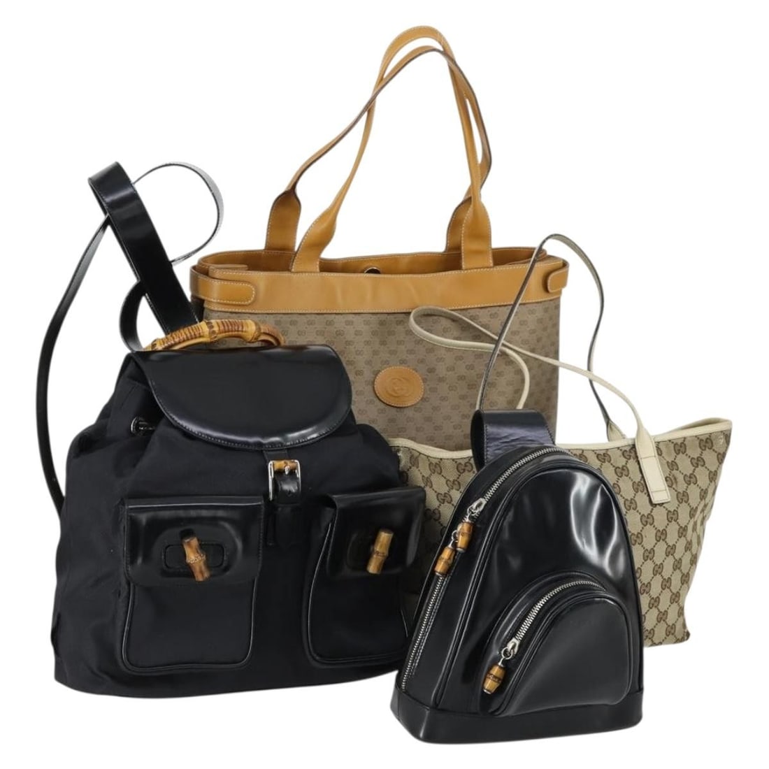 Gucci Black GG Micro Supreme Canvas and Leather Bamboo Shoulder Bag Set of 4: Gucci Black GG Micro Supreme Canvas and Leather Bamboo Shoulder Bag Set of 4 This is a Gucci GG Canvas GG Micro Supreme Bamboo shoulder bag set crafted from black and beige leather and GG canvas. Made