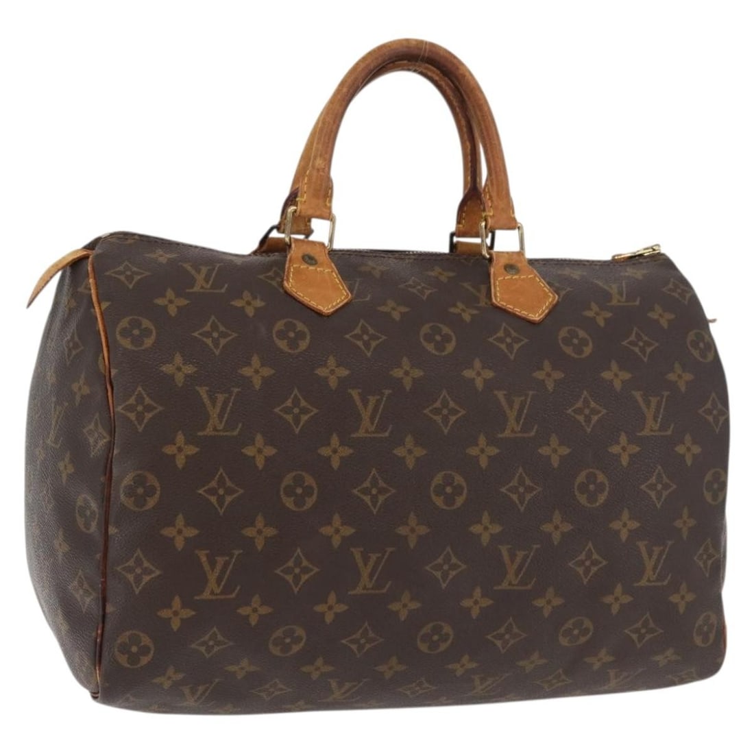 Louis Vuitton Speedy 35 Monogram Canvas Handbag M41524: Louis Vuitton Speedy 35 Monogram Canvas Handbag M41524 This Louis Vuitton Monogram Speedy 35 handbag features the signature monogram canvas exterior and is crafted in France. The bag measures approxim