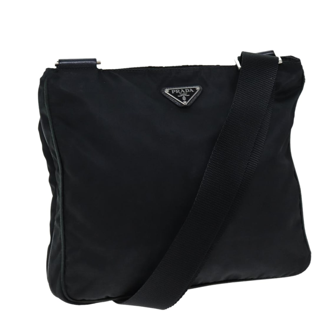 Prada black nylon women s shoulder bag Italy 12.2 x 10.2 x 2.4 inch: Prada black nylon women s shoulder bag Italy 12.2 x 10.2 x 2.4 inch This PRADA shoulder bag is crafted from black nylon and designed for women. Made in Italy, the bag features a practical and stylish 