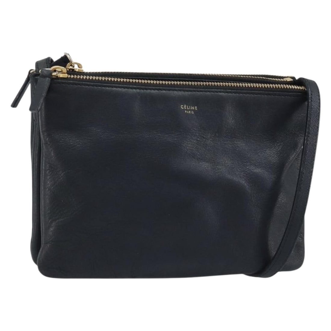 Celine Trio Black Leather Shoulder Bag with Gold Tone Hardware: Celine Trio Black Leather Shoulder Bag with Gold Tone Hardware This CELINE Trio shoulder bag is crafted from black leather with gold-tone accents. Designed for women, it features an adjustable shoulde