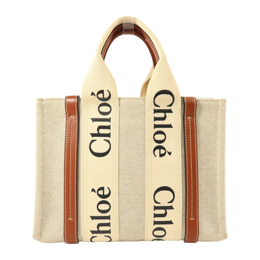 Chloe Beige Canvas Tote Bag Woody Small: Chloe Beige Canvas Tote Bag Woody Small This Chloe Woody Small Tote Bag features a beige and brown canvas exterior, offering a stylish and versatile accessory for everyday use. Designed for women, the