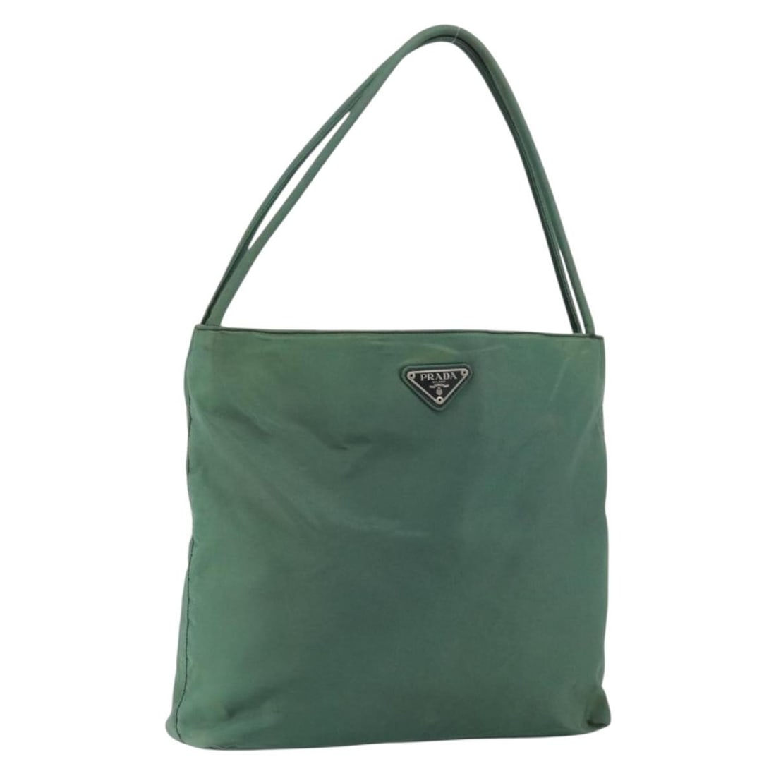 Green Nylon Tote by Prada with Guarantee Card Italy: Green Nylon Tote by Prada with Guarantee Card Italy This Prada tote bag is crafted from green nylon and designed for women. Made in Italy, it features a practical handle drop and comes with a guarante
