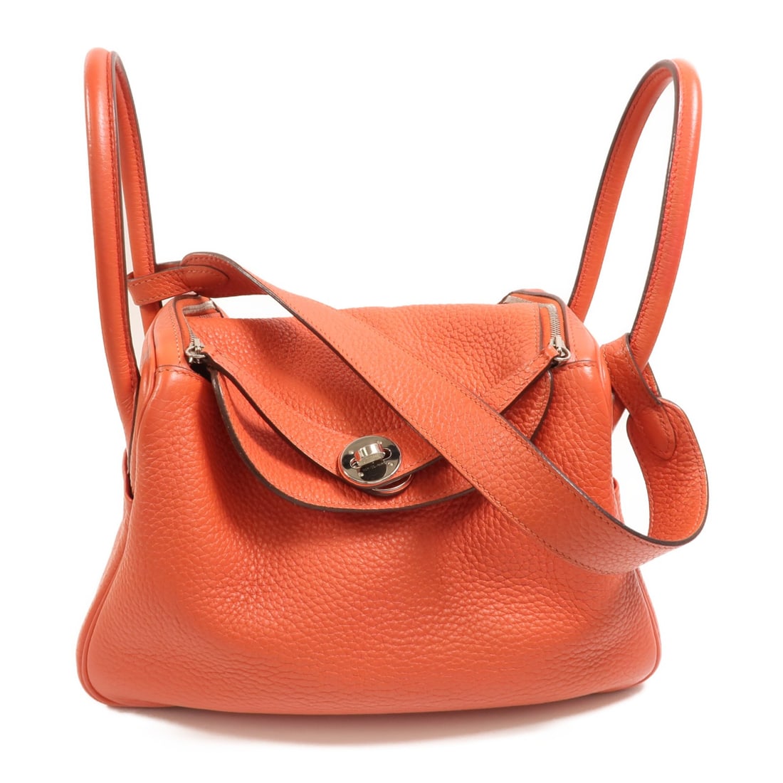 Hermes Lindy 26 Rouge Pivoine calfskin 2 way shoulder bag: Hermes Lindy 26 Rouge Pivoine calfskin 2 way shoulder bag This Hermes Lindy 26 is a versatile 2-way shoulder bag crafted from red calfskin leather. Designed for women, it features a spacious interior 