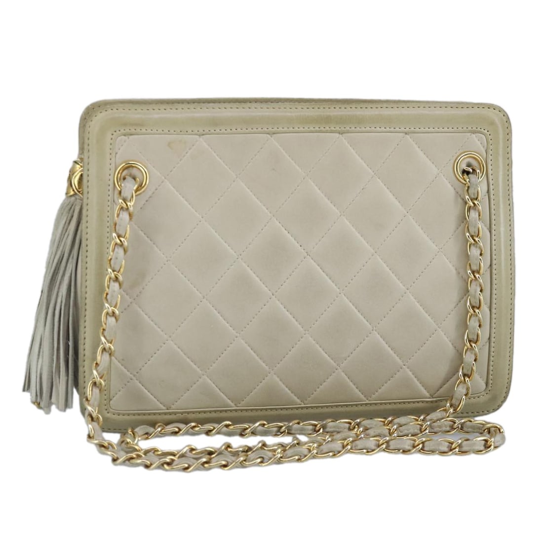 Chanel Beige Lambskin Matelasse Shoulder Bag with Gold Chain and CC Logo: Chanel Beige Lambskin Matelasse Shoulder Bag with Gold Chain and CC Logo This CHANEL Matelasse chain shoulder bag is crafted from beige lambskin leather with gold-tone accents. Designed for women, the