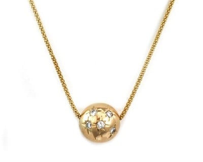 14k Yellow Gold Diamond Ball Pendant Necklace 19 inch Flex Mesh: 14k Yellow Gold Diamond Ball Pendant Necklace 19 inch Flex Mesh This vintage estate necklace features a sculptural round ball pendant with a starburst design, highlighted by a central diamond set in s