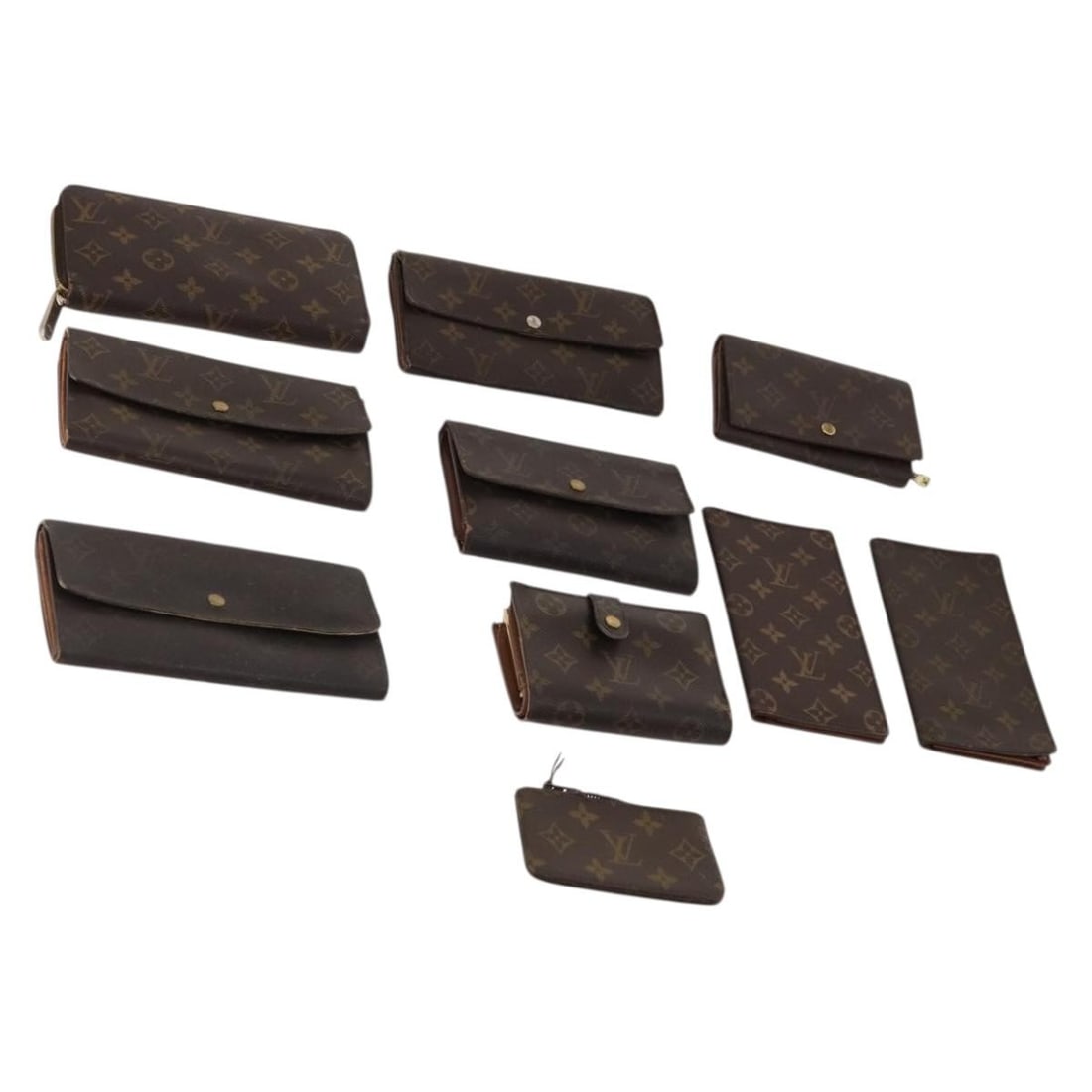 Louis Vuitton Monogram Canvas Women Wallet Special Set: Louis Vuitton Monogram Canvas Women Wallet Special Set This is a set of 10 Louis Vuitton Monogram wallets for women, crafted from signature Monogram Canvas and made in France. The wallets show signifi