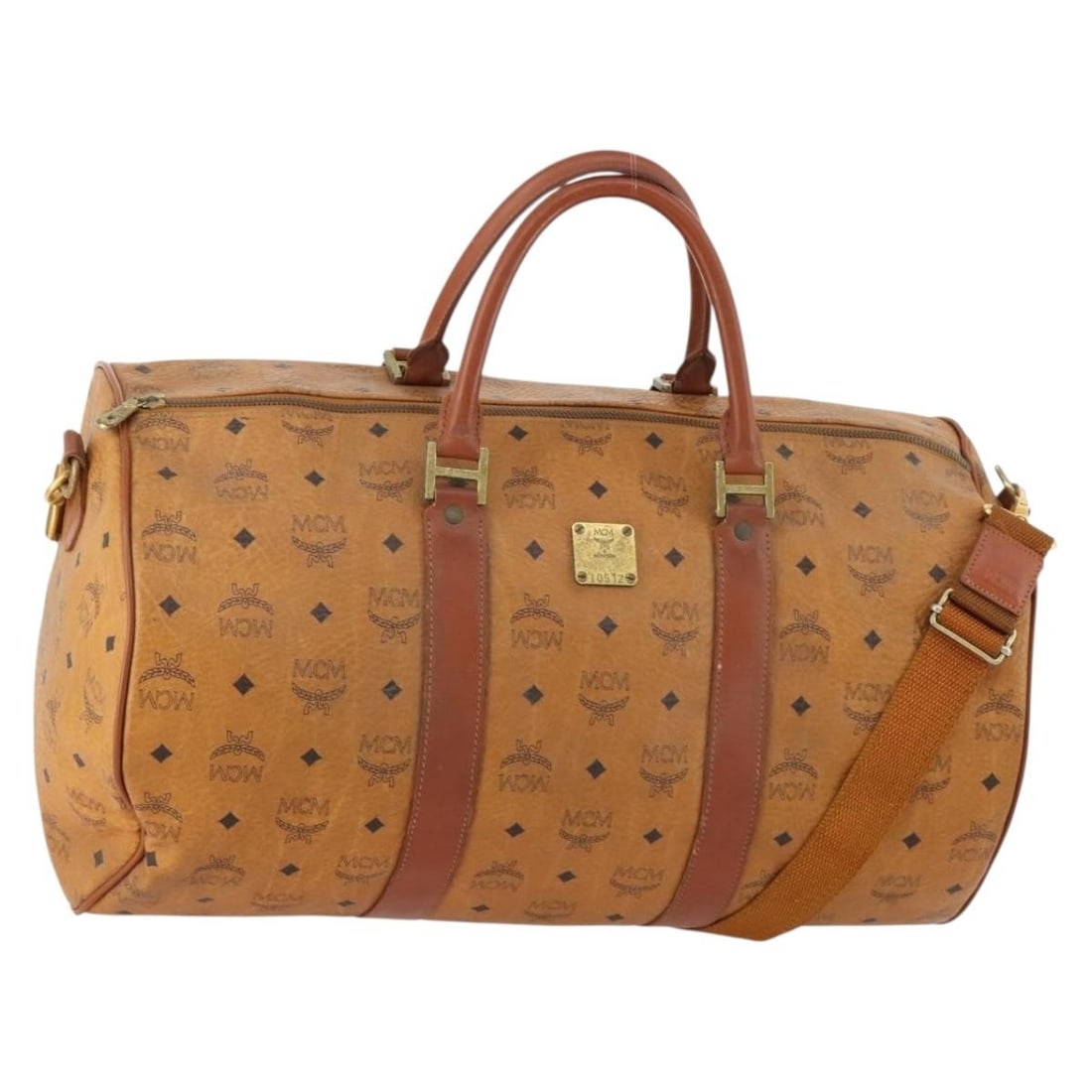 MCM Vicetos Brown PVC Boston Bag with Dual Carry Option and Shoulder Strap: MCM Vicetos Brown PVC Boston Bag with Dual Carry Option and Shoulder Strap This MCM Logogram Vicetos Boston Bag features a brown and gold color scheme and is crafted from PVC leather. Designed as a ve