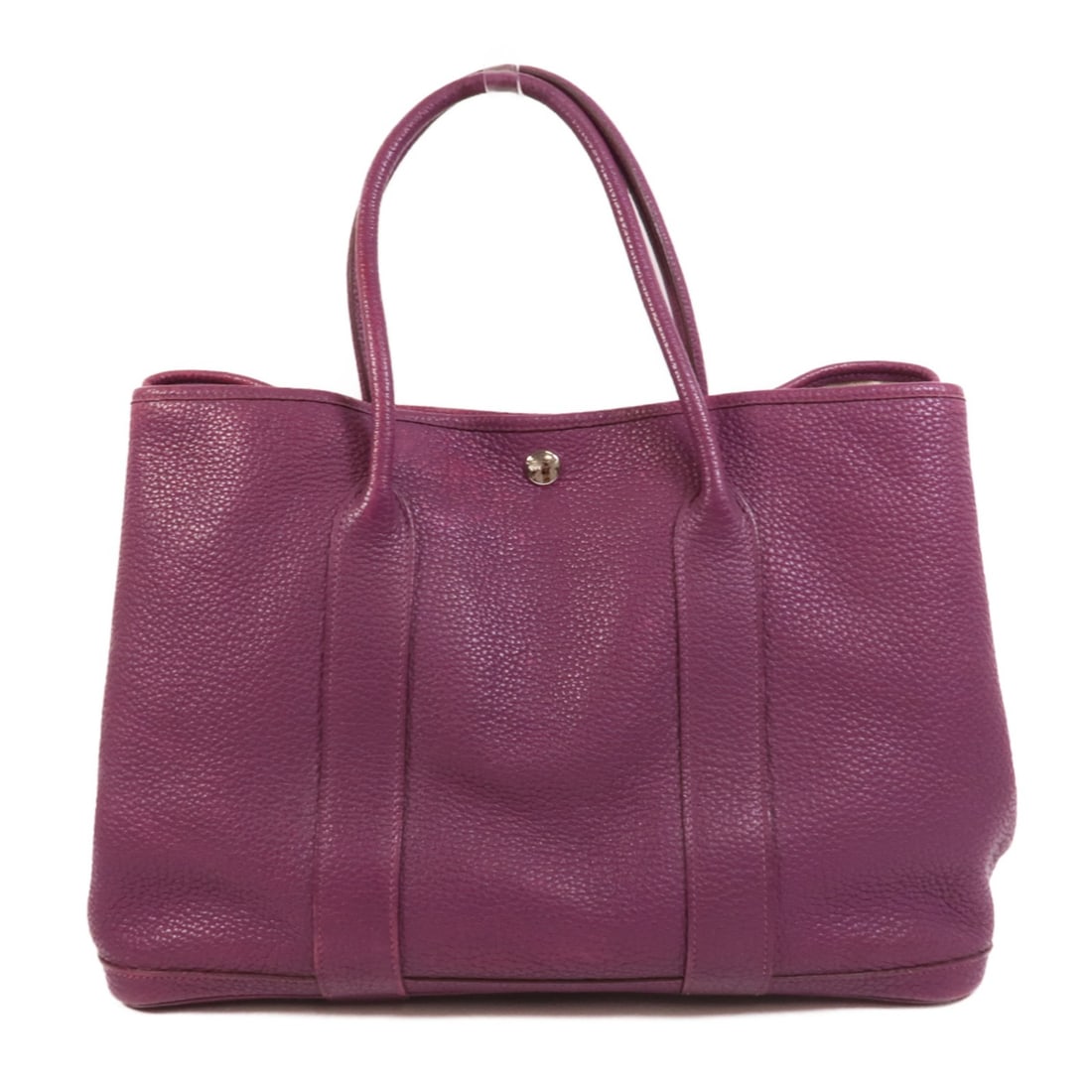 Hermes Garden Party PM Purple Taurillon Clemence Tote Bag: Hermes Garden Party PM Purple Taurillon Clemence Tote Bag This Hermes Garden Party PM tote bag is crafted from Taurillon Clemence calfskin leather in a striking purple hue. Designed for women, it feat