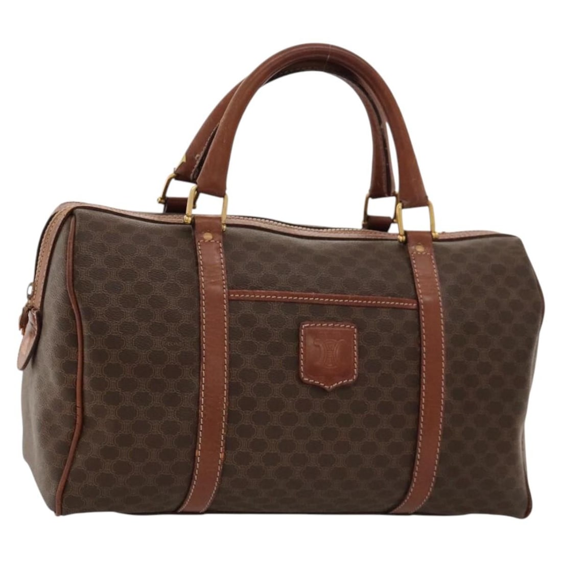 Celine Macadam Boston Bag Brown PVC Leather Gold Accents: Celine Macadam Boston Bag Brown PVC Leather Gold Accents This CELINE Boston bag features the signature Macadam canvas with PVC leather accents in brown and gold tones. Designed for women, the bag offe