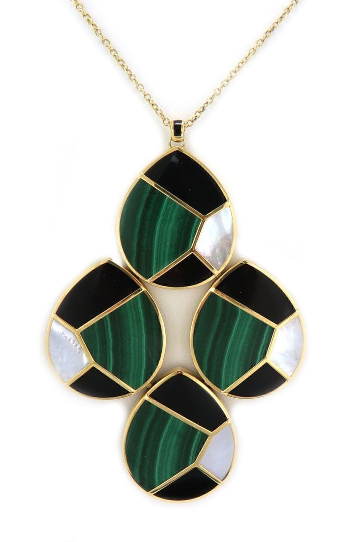 Ippolita 18k Yellow Gold Mosaic Pendant Necklace: Ippolita 18k Yellow Gold Mosaic Pendant Necklace This authentic Ippolita necklace features a large, elongated pendant crafted from a mosaic of malachite, mother-of-pearl, and black onyx, set in solid 