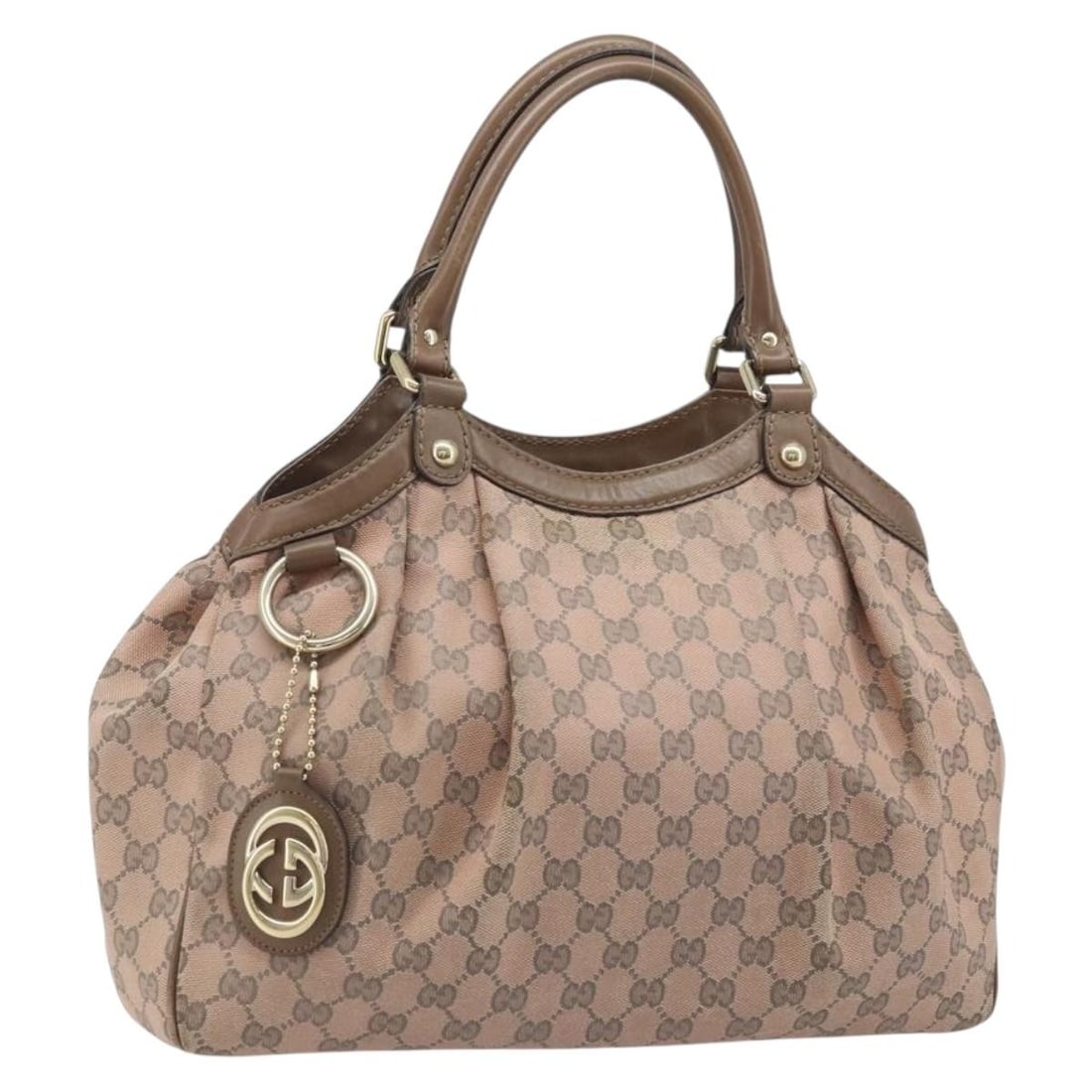 Gucci Sukey GG Canvas Pink Gold Tote Bag with Charm 211944: Gucci Sukey GG Canvas Pink Gold Tote Bag with Charm 211944 This is a Gucci GG Canvas Sukey hand bag in pink and gold. The exterior is crafted from GG canvas with leather trim, featuring dual top handl