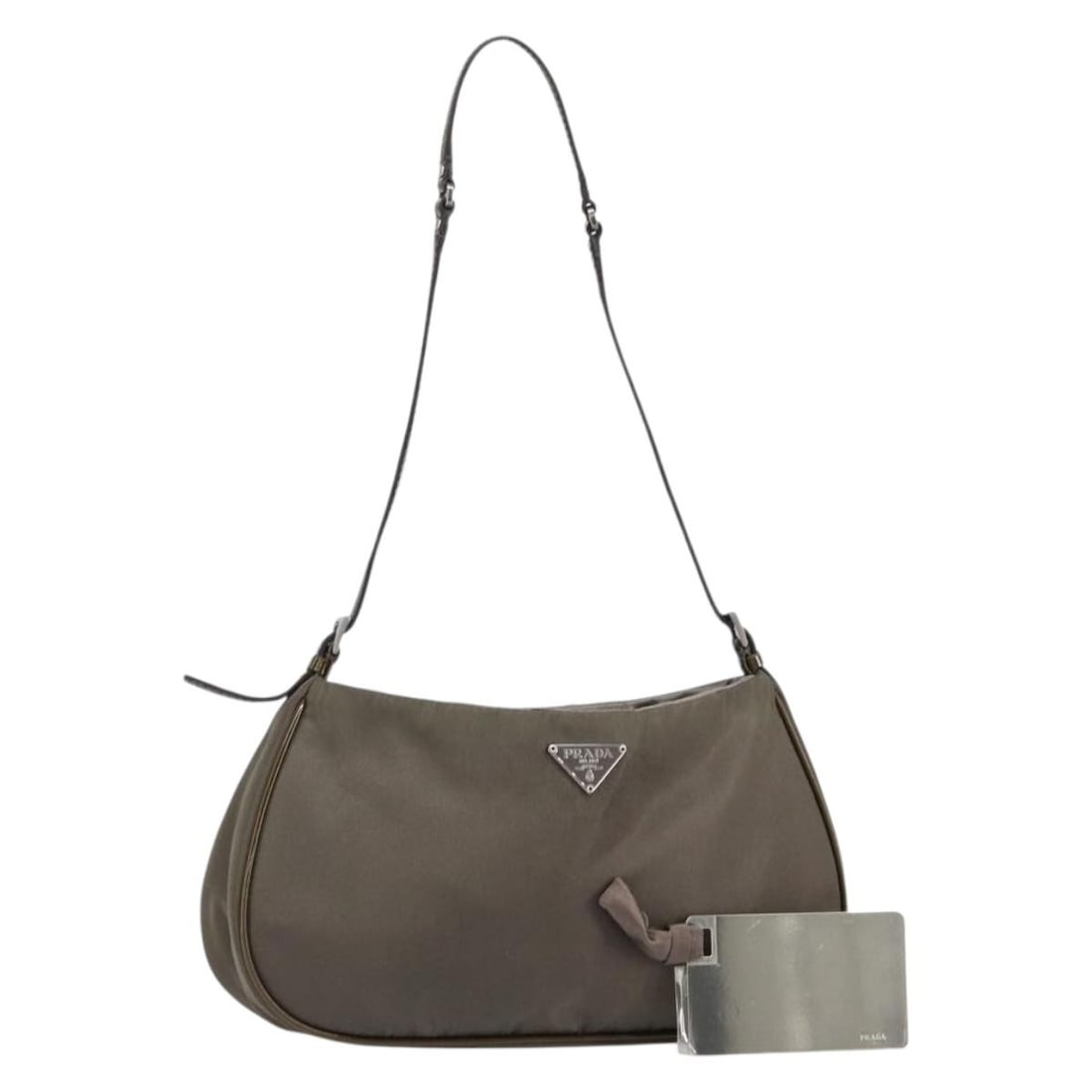 Prada Nylon Khaki Silver Shoulder Bag with Mirror Italy: Prada Nylon Khaki Silver Shoulder Bag with Mirror Italy This PRADA shoulder bag is crafted from durable nylon in a khaki and silver color combination. Designed for women, it features a compact silhoue
