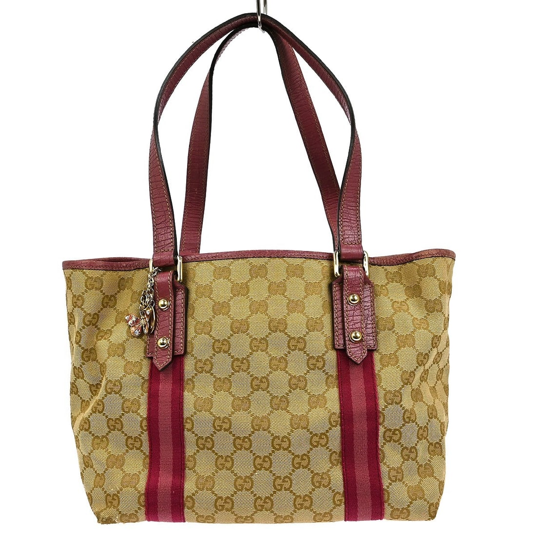 Gucci GG Canvas Medium Beige Tote with Pink Handles Model 137396 491104: Gucci GG Canvas Medium Beige Tote with Pink Handles Model 137396 491104 This Gucci tote handbag features the iconic beige GG canvas pattern with pink handles and leather trim. The medium-sized bag is 