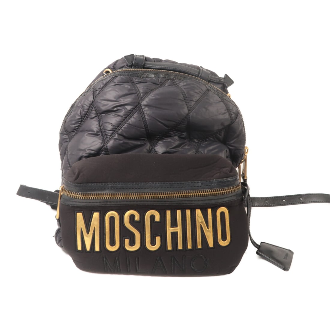Moschino Black Nylon Rucksack Backpack: Moschino Black Nylon Rucksack Backpack This Moschino rucksack backpack is crafted from black nylon and features a practical and stylish design. The bag is designed for women and offers ample space for