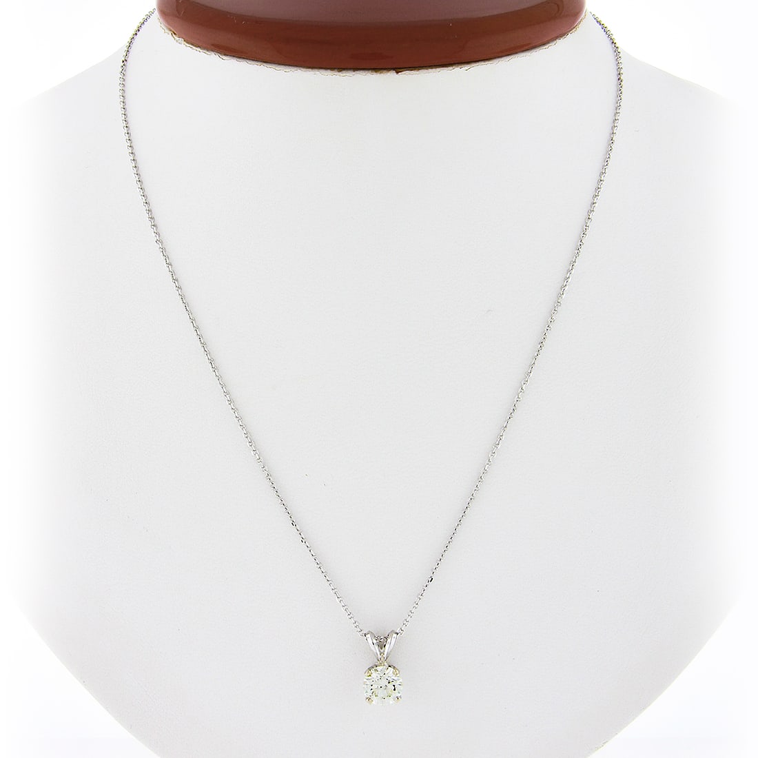 Classic 14k White Gold 0.96ctw Diamond Solitaire Pendant with 18" Chain: Classic 14k White Gold 0.96ctw Diamond Solitaire Pendant with 18" Chain This exquisite pendant necklace features a stunning round brilliant diamond, weighing approximately 0.96 carats, elegantly prong