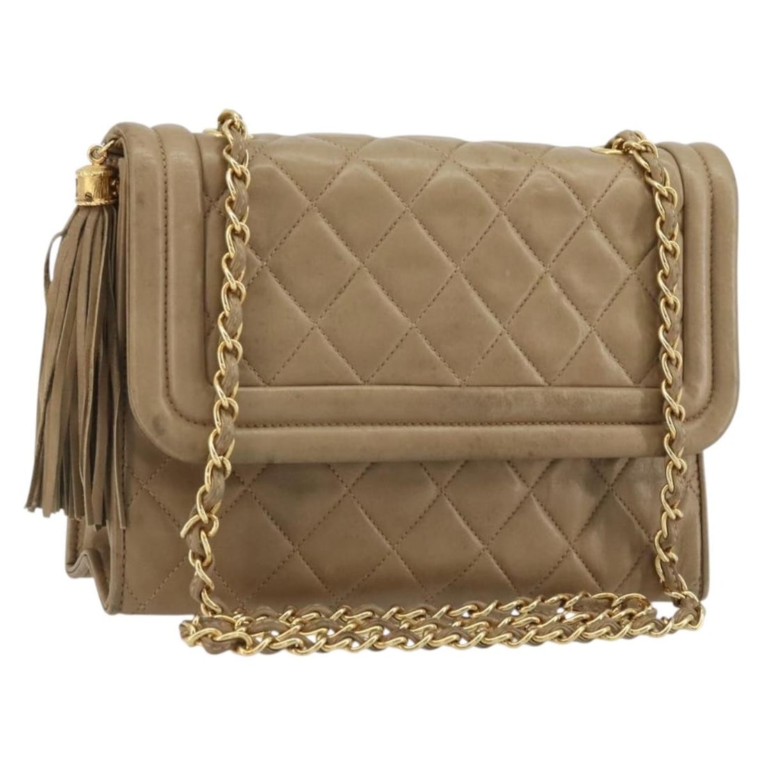 Beige Lambskin Shoulder Bag by CHANEL with Gold Chain and CC Logo: Beige Lambskin Shoulder Bag by CHANEL with Gold Chain and CC Logo This CHANEL chain shoulder bag features luxurious beige lambskin leather with gold-tone accents and a signature CC logo. Designed for 