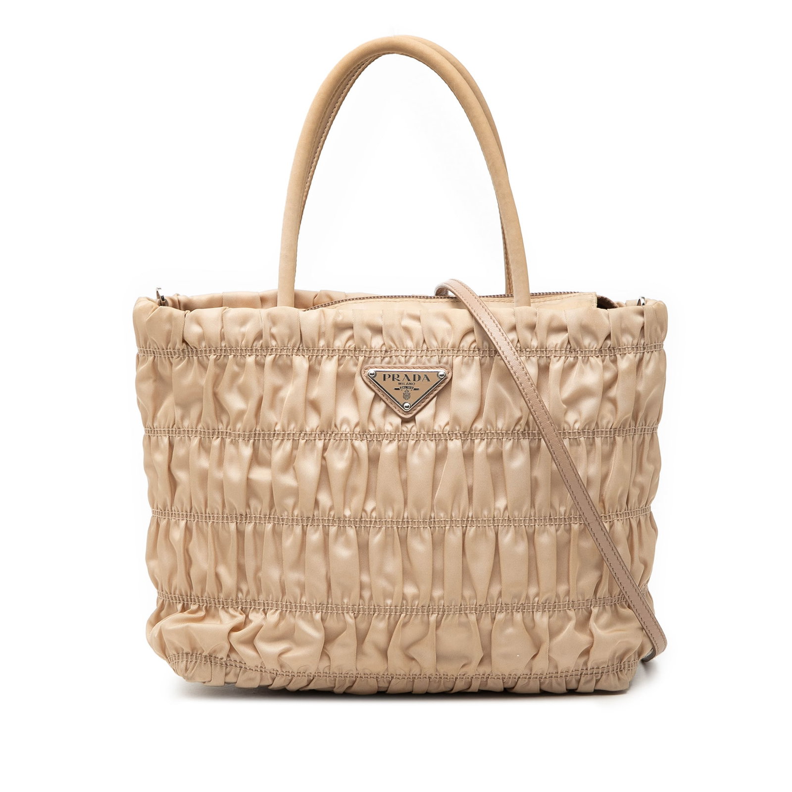 Beige Prada Tessuto Gaufre Gathered Nylon Satchel with Detachable Strap: Beige Prada Tessuto Gaufre Gathered Nylon Satchel with Detachable Strap This Prada Tessuto Gaufre Satchel showcases a gathered beige nylon body with rolled handles and a detachable flat leather strap.